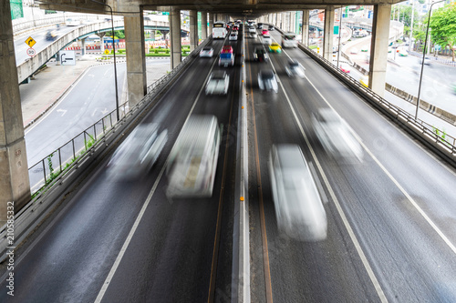 Motion blur of car on the road in the city