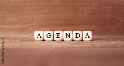 Word AGENDA made with wood building blocks