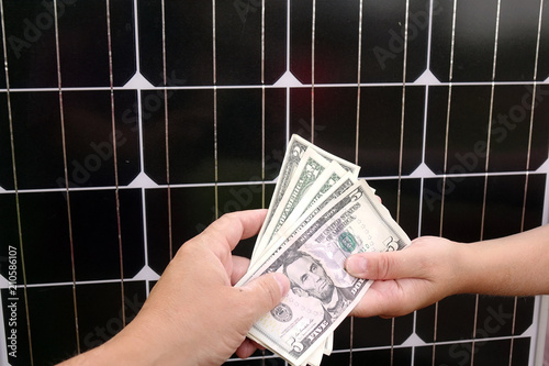 Saving American money on renewable energy and solar panels photo