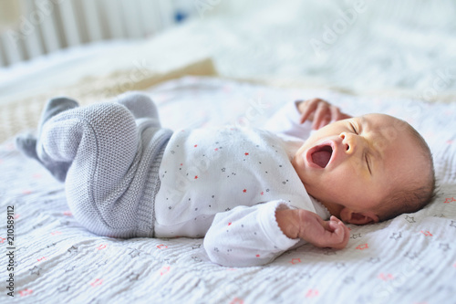 Fotótapéta Newborn baby girl yawning