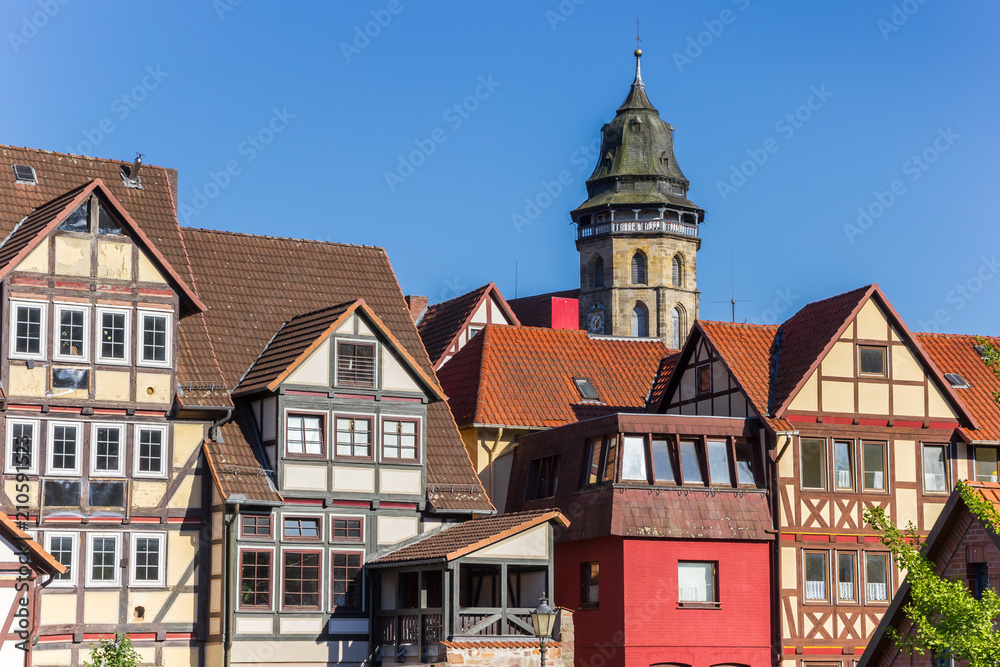 Church tower and old houses in Hannoversch Munden, Germany