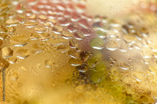 Close-up of a pan lid with droplets from a hot steam