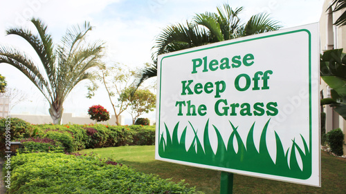 Please keep off the grass. The palms. Environment protection.