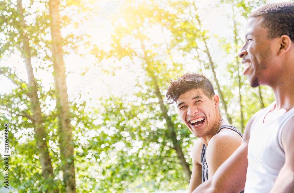 Happy African American Man Talking With Mixed Race Man Outdoors Happy African American Man Talking With Mixed Race Man Outdoors