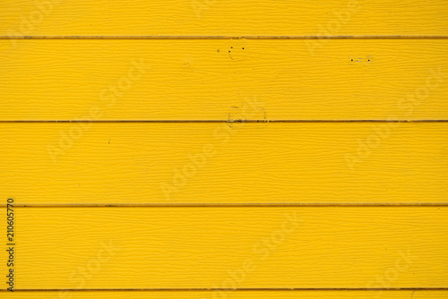 Yellow pained wooden plate