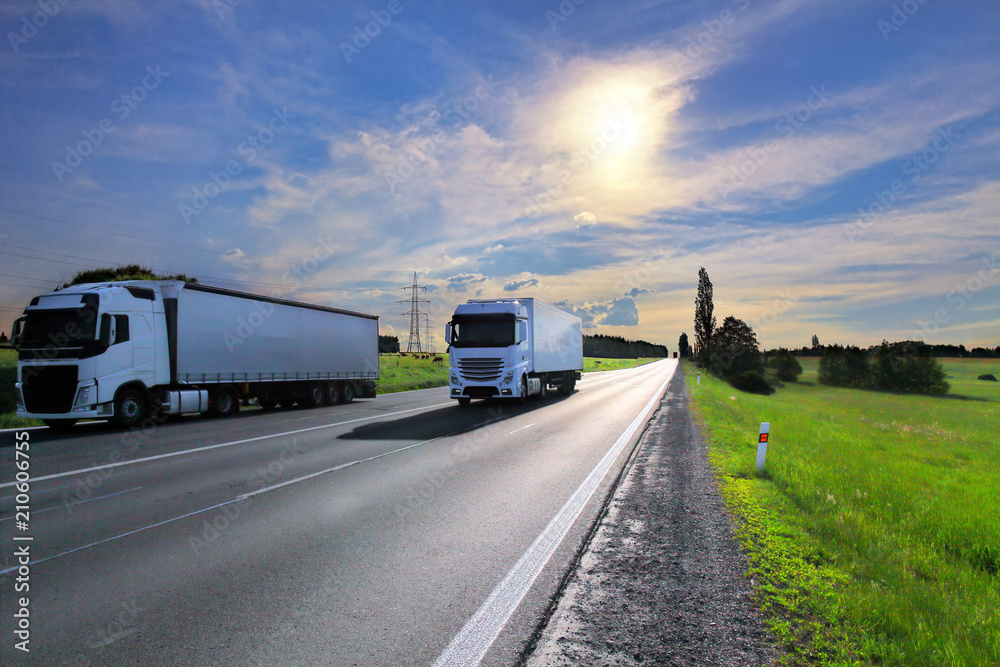 Truck transportation on the road at sunset