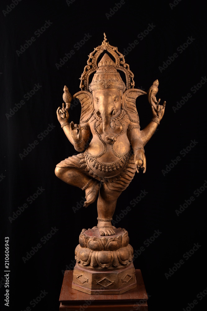Lord Ganesha standing bronze statue on black background.. Stock Photo |  Adobe Stock