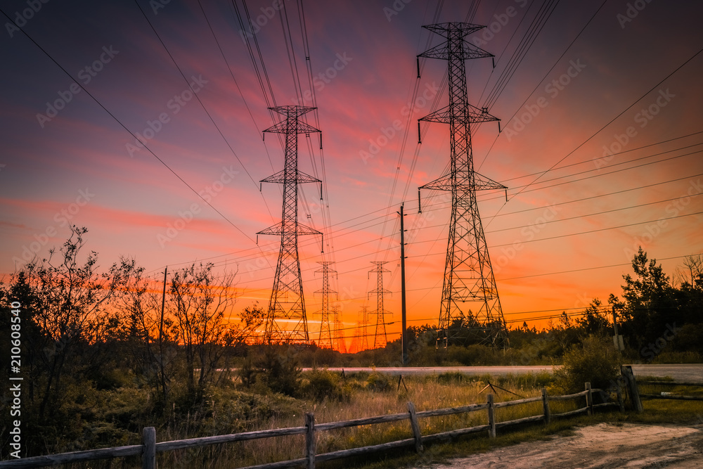 OTTAWA, ONTARIO / CANADA - JUNE 10 2018: ELECTRICAL POWER LINE AT SUNRISE