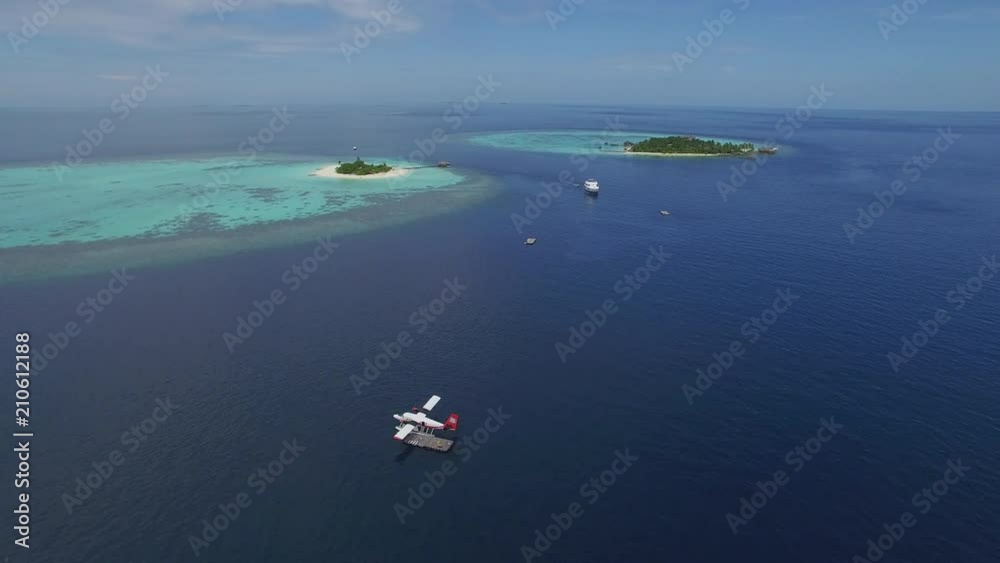 Aerial view of tropical landscape - seaplane parking at sea Aerial view of tropical landscape - seaplane parking at sea