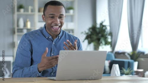 Online Video Chat on Laptop at Work