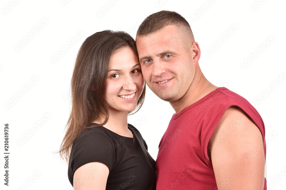 Young family on a white background. Perfect pair. A good relationship. Strong friendship. Young family on a white background. Perfect pair. A good relationship. Strong friendship.