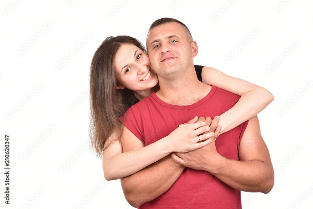 Young family on a white background. Perfect pair. A good relationship. Strong friendship. Young family on a white background. Perfect pair. A good relationship. Strong friendship.