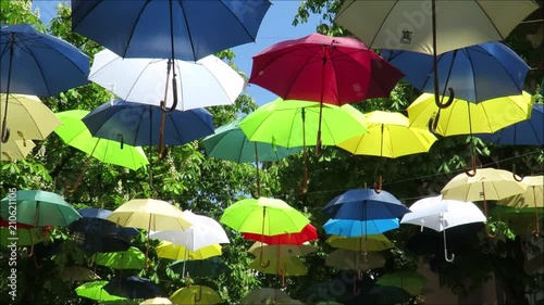 Wallpaper Mural Festive Street with Colorful Umrellas as decoration and wind blowing Torontodigital.ca