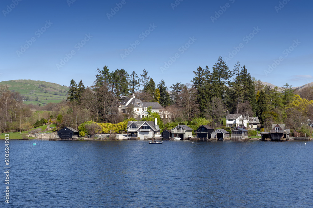 Fototapeta premium Beautiful lakeside village situated on the bank of Lake Windermere in the scenic Lake District National Park, South Lakeland, North West England, UK