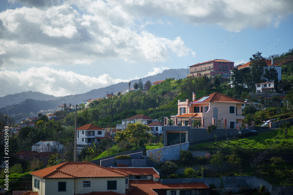 A view of across the roof tops of Funchal, Madeira from the chair lift up the hill behind the city