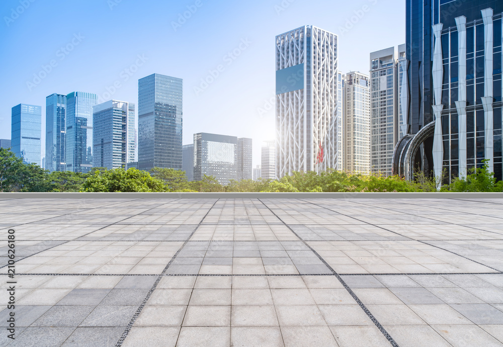 Urban skyscrapers with empty square floor tiles