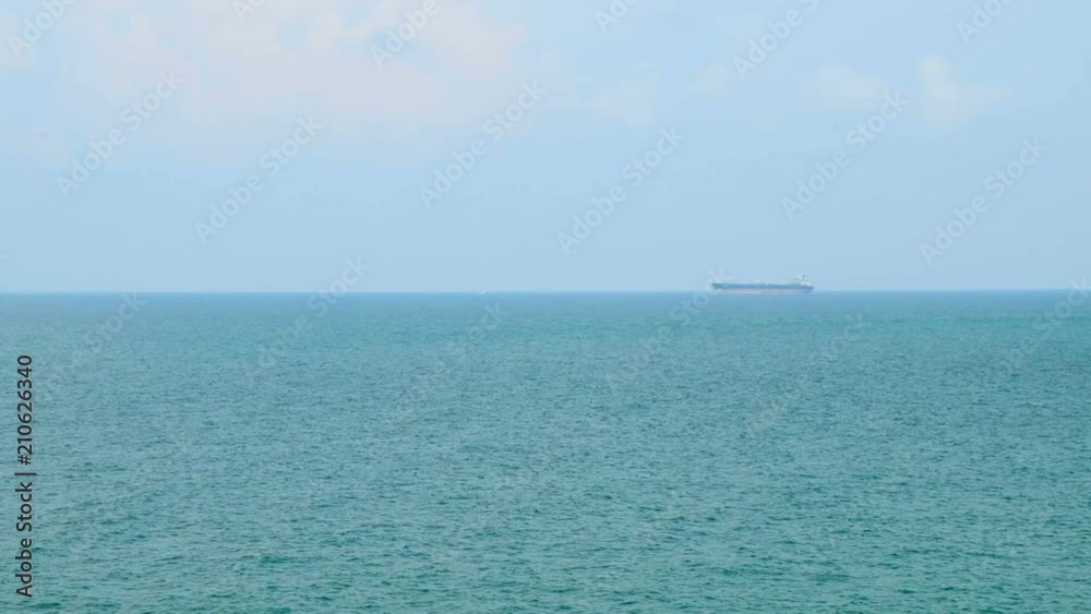 Dramatic seascape view with oil tanker ship from koh sichang, chon buri, thailand, HD video with copy space Dramatic seascape view with oil tanker ship from koh sichang, chon buri, thailand, HD video with copy space