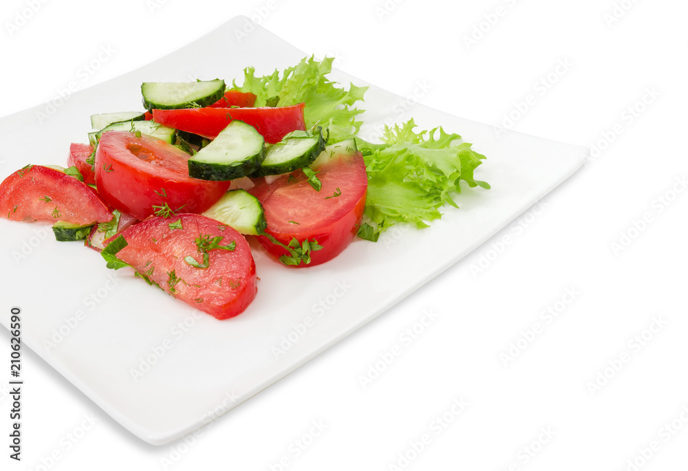 Vegetable salad with tomatoes and cucumbers closeup at selective focus