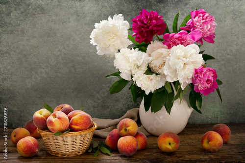 still life with a bouquet of peonies and peaches
