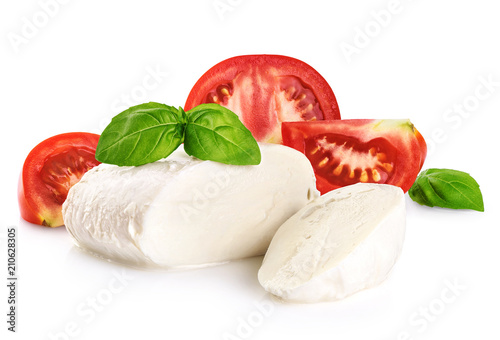 Mozzarella tomatoes and basil isolated on white background.