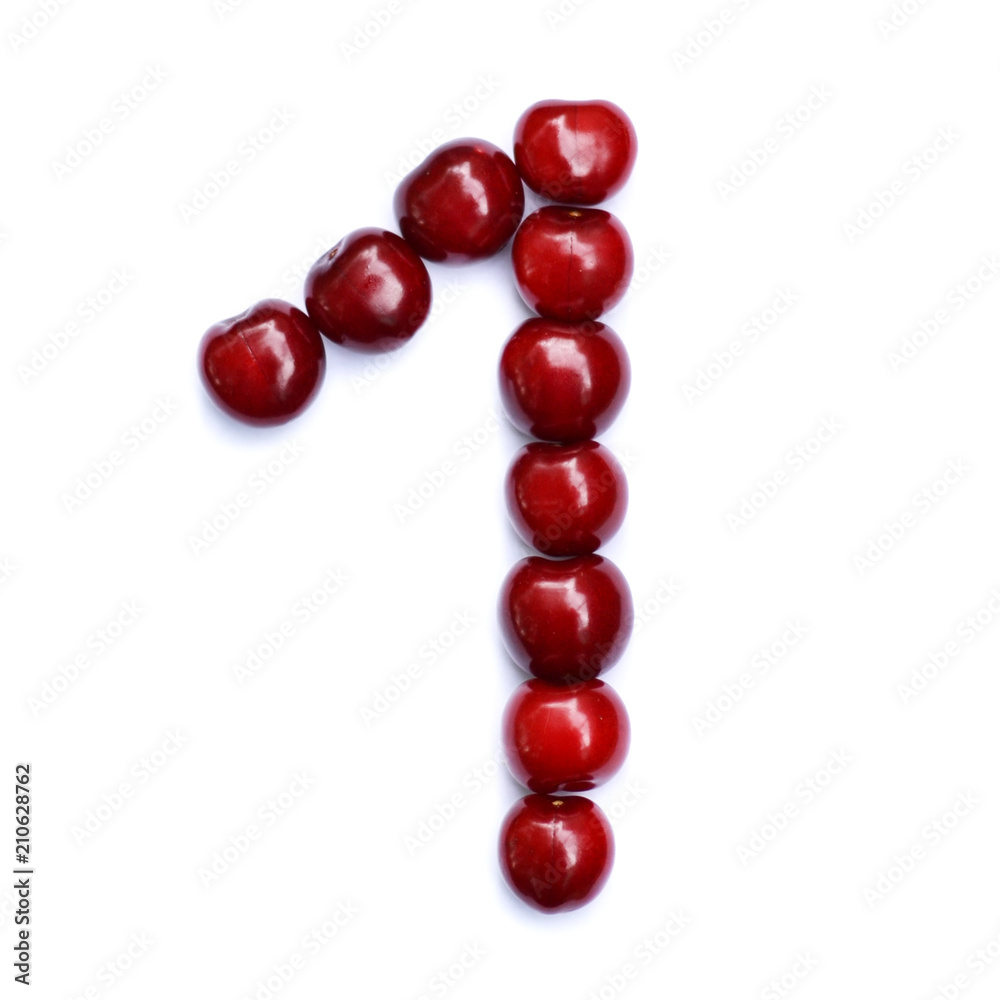 Number one. A figure composed of cherries isolated on a white background. Number one. A figure composed of cherries isolated on a white background.