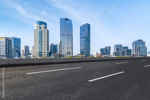 Air highway asphalt road and office building of commercial building in modern city