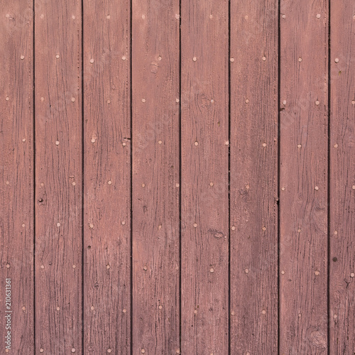 background consisting of reddish brown peeling paint on wooden shutters