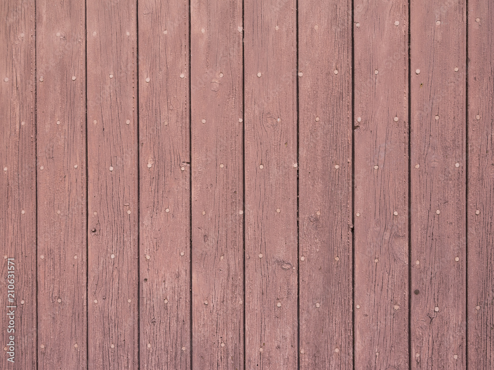 Fototapeta premium background consisting of reddish brown peeling paint on wooden shutters