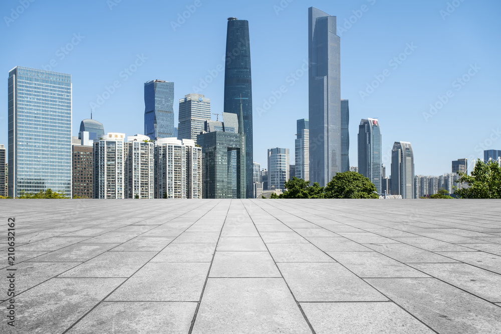 Urban skyscrapers with empty square floor tiles