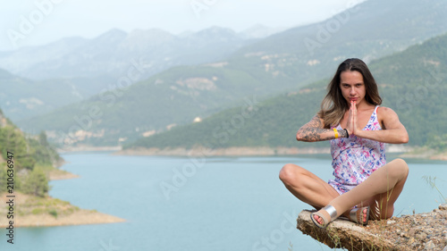 The girl is engaged in meditation on vacation in Alanya © yESvideo.com.ua