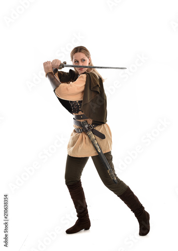 full length portrait of girl wearing brown medieval costume,. standing pose, isolated on white studio background.