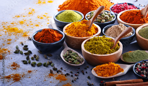 Fototapeta Naklejka Na Ścianę i Meble -  Variety of spices on kitchen table