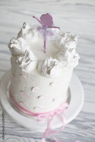 Children's pink cake. birthday pink cake. Tiered birthday cake.