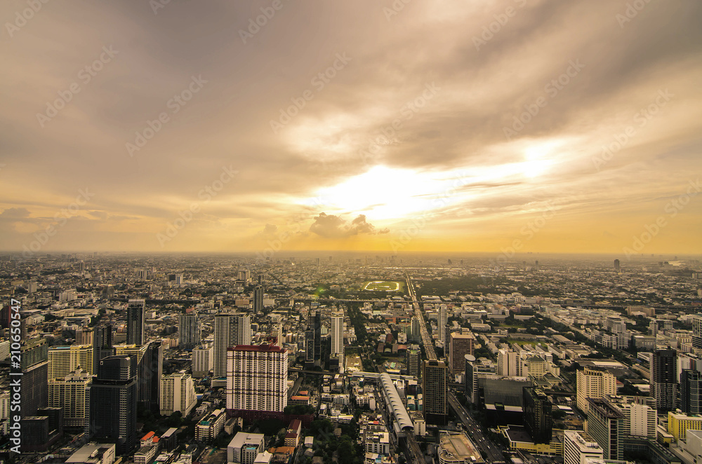 Bangkok cityscape skyline  which is metropolis & favorite city of tourists around the world. The city located between modern building skyscraper while beautiful twilight hour,from baiyok sky tower.