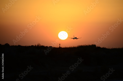 Airplane and sunset