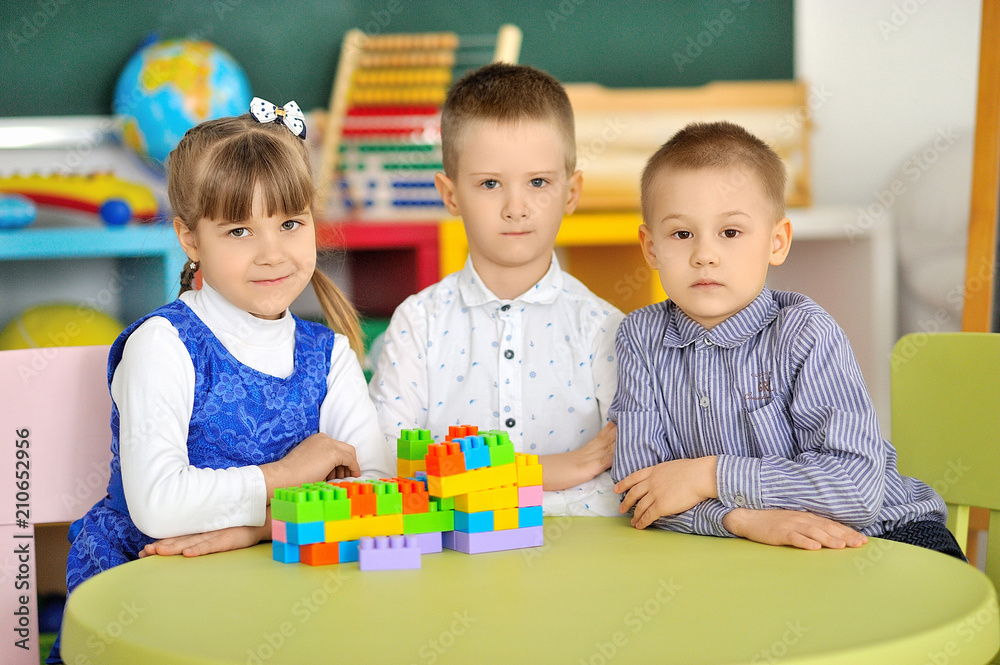 Fototapeta premium Children play in the children's room