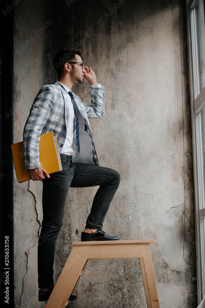 Future success. first step. Businessman start climbing stair for success, career, work, job, achievement, development, growth, progress, vision, future Future success. first step. Businessman start climbing stair for success, career, work, job, achievement, development, growth, progress, vision, future