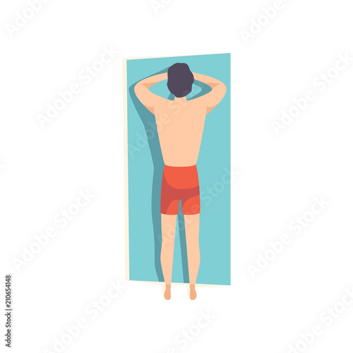 Young man lying on his stomach and sunbathing on the beach, top view of lying guy vector Illustration on a white background
