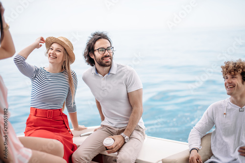 Caucasian attractive just married couple having their honeymoon trip on a luxury sailing boat at summer Carribean Sea © alfa27
