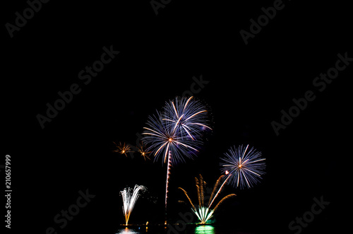 Amazing beautiful colorful fireworks light display on celebration up the sky night.