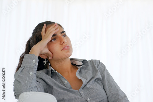 A lonely young woman, she is depressed and separated from problems in her personal life. The concept of loneliness and loss of love. photo