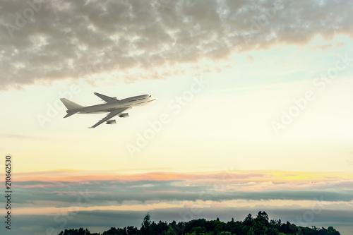 an Airplane and the sunset sky © magann