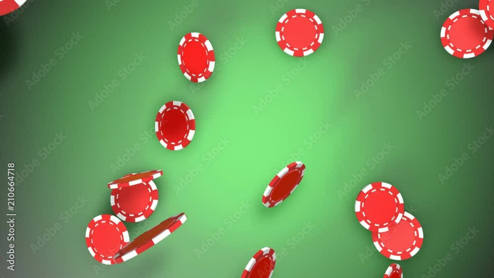 Red poker chips falling down on green play table. 