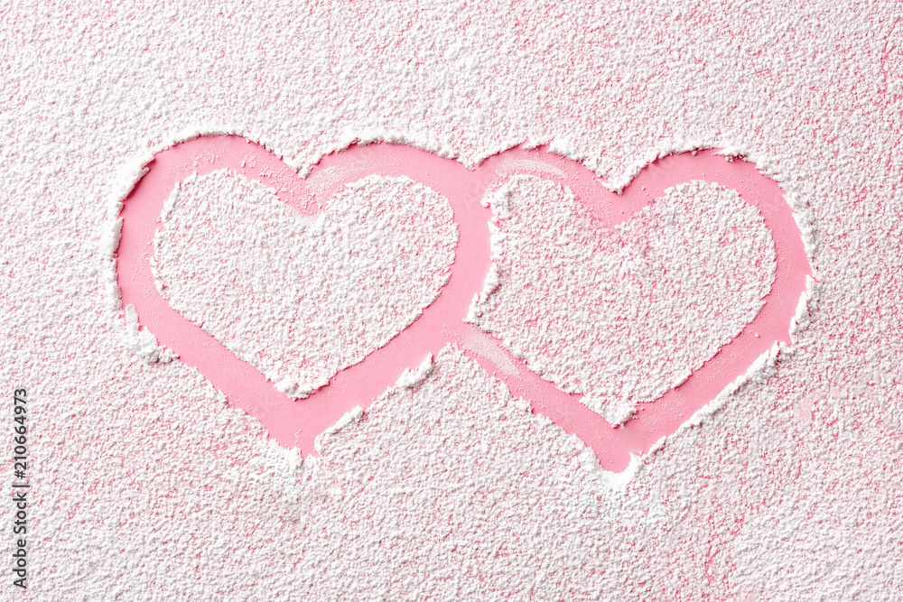 Pink hearts in powder sugar