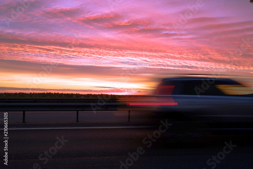 Interchange of the highway. Dramatic sky, fiery sunset. photo