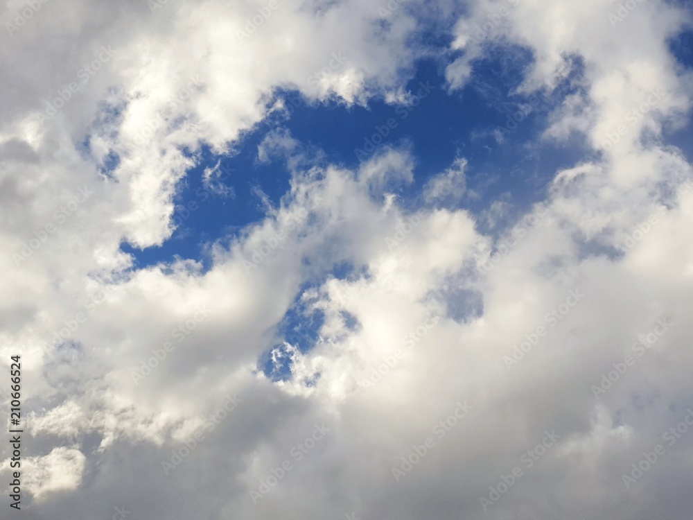 Beautiful nature of blue sky and clouds with the sun shining, sky background, cloudscape concept. Space for text in template, Empty, Looking up Beautiful nature of blue sky and clouds with the sun shining, sky background, cloudscape concept. Space for text in template, Empty, Looking up