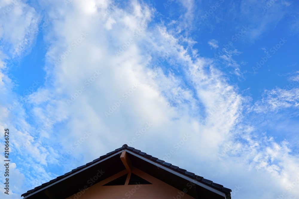 Looking up roof with home on blue sky and clouds, Beautiful nature blue sky with clouds, cloudscape concept. Space for text in template. Empty.