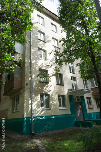 Russia, Moscow. 23 JUN 2018. Facade of 5 floor residental building. Typical russian neighborhood photo