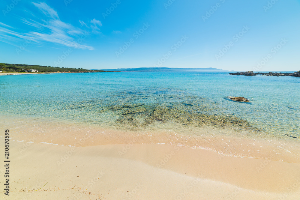 Clear water and white sand in Le Bombarde beach
