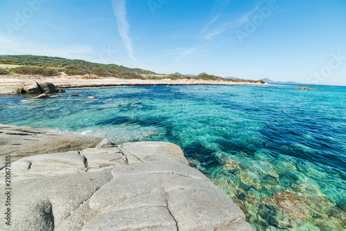 Rocks by the sea in Sant Elmo beach in Castiadas photo